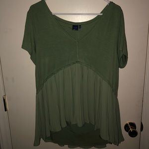 Green ruffled shirt